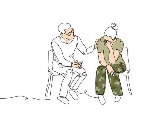 One person consoling another person, and talking with them.